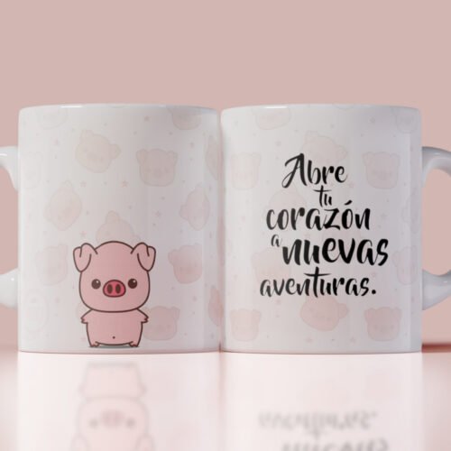 Taza blanca con ilustración de cerdito tierno y frase inspiradora “Abre tu corazón a nuevas aventuras”, ideal como regalo original con mensaje positivo.
